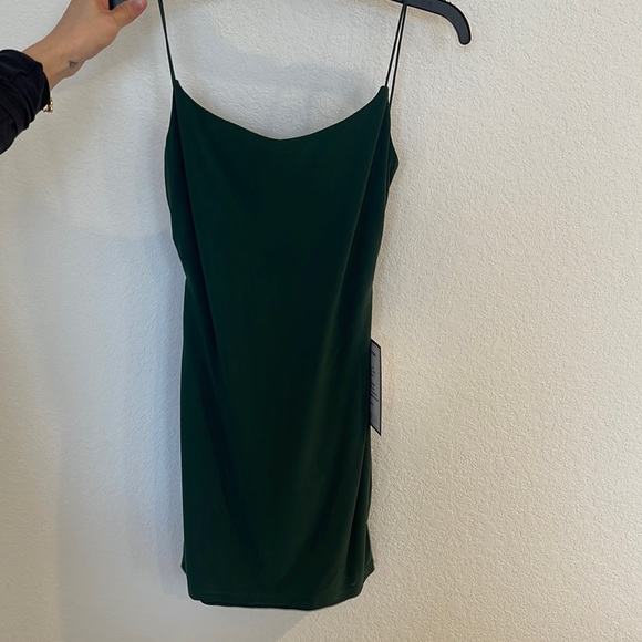 New !! decided to go with something else. But beautiful fitting backless dress - Picture 1 of 2